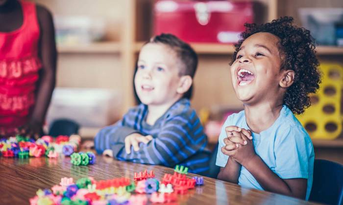Kindergarten children laughing