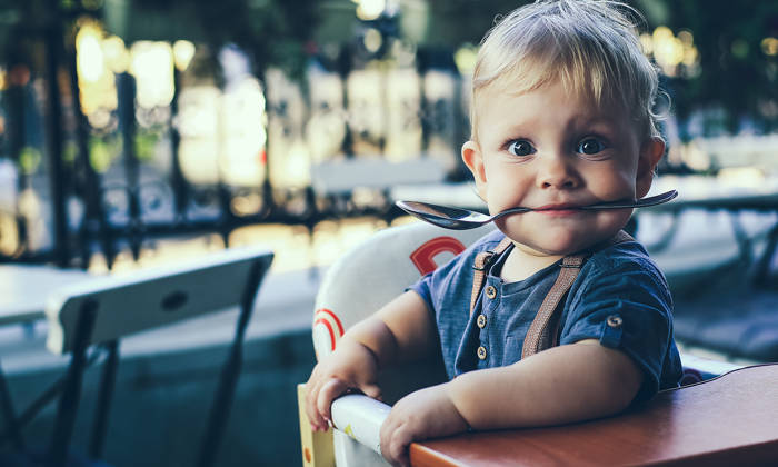 Little boy at a cafe