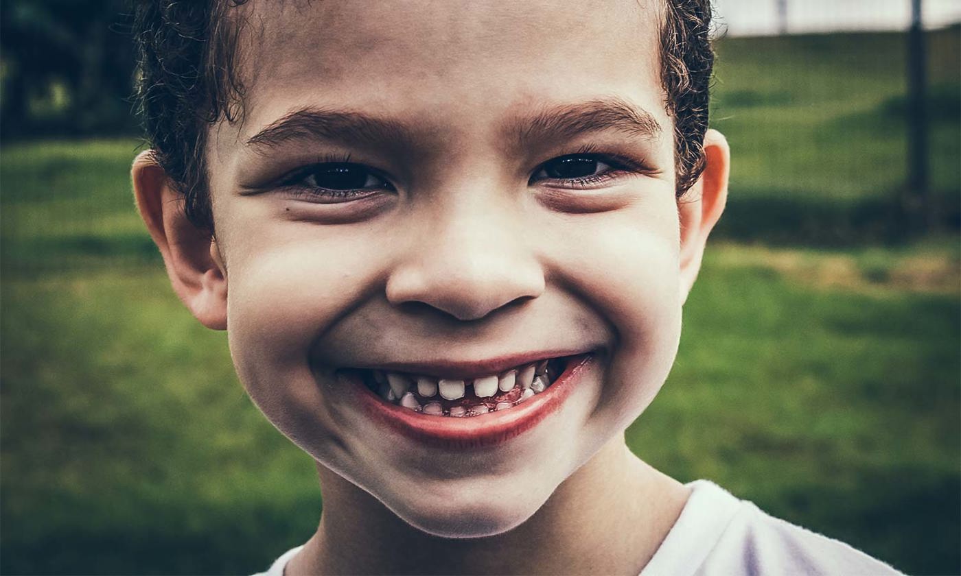 Young boy with a big smile