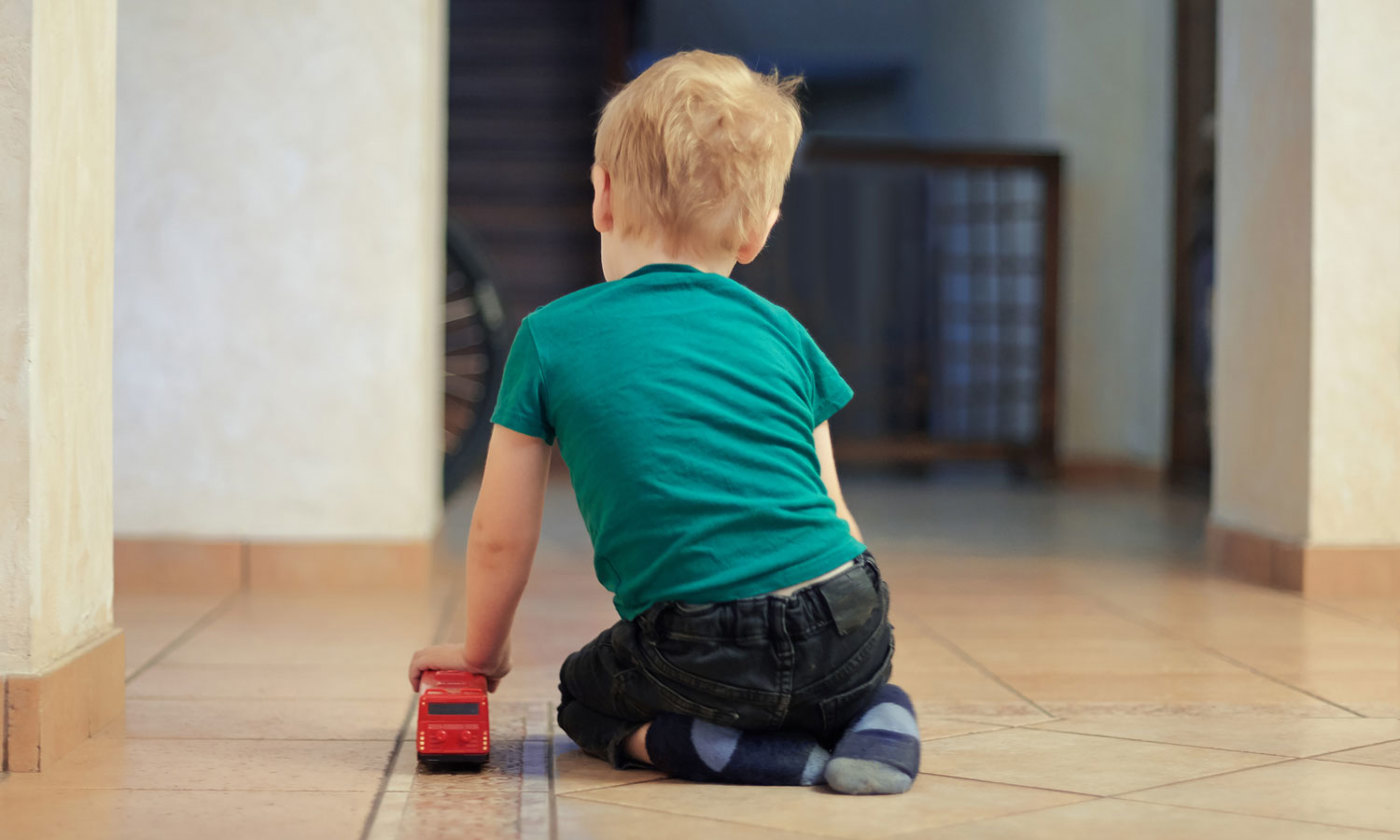 Little boy playing on the floor