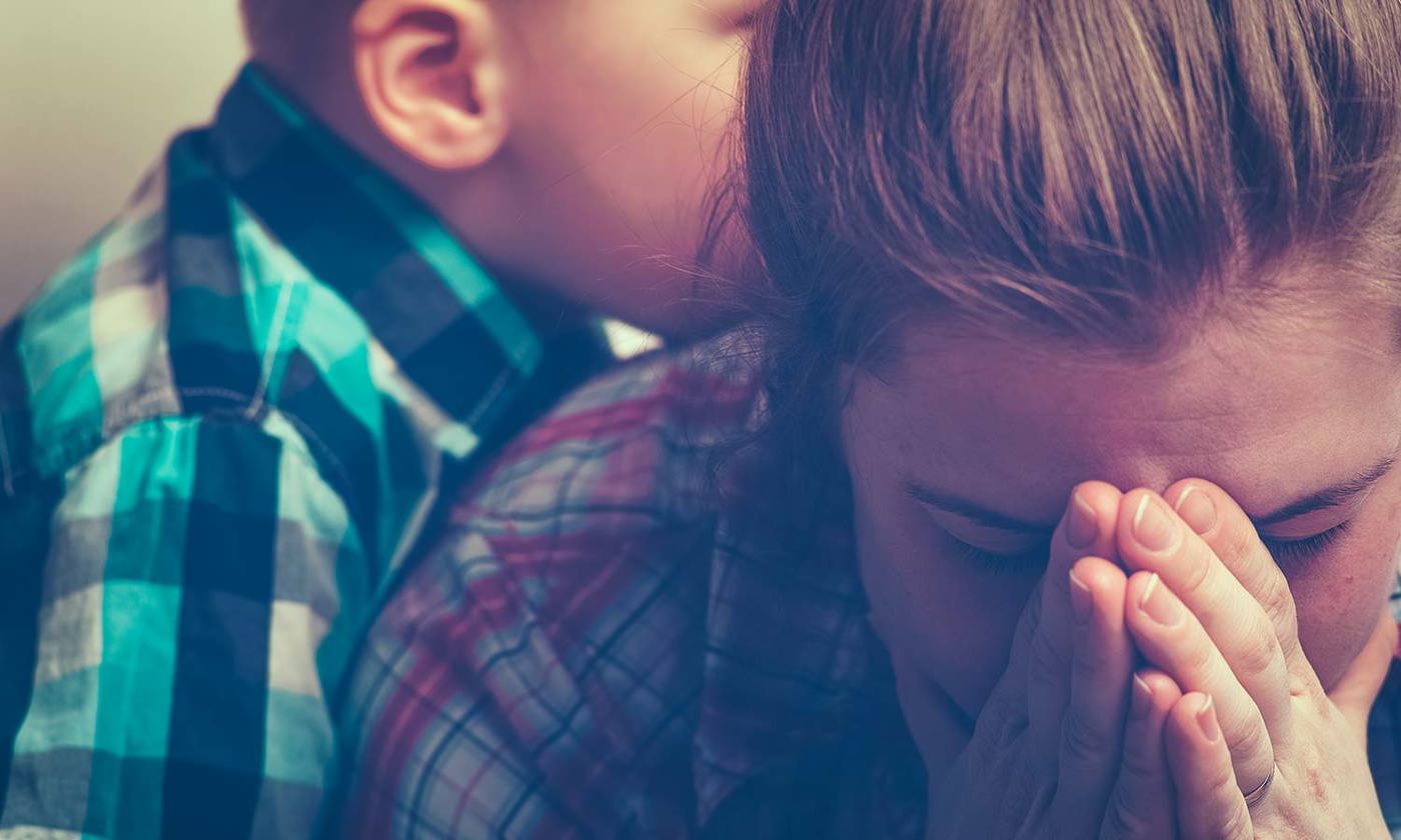 Sad mother with child