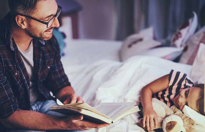 Father reading to child