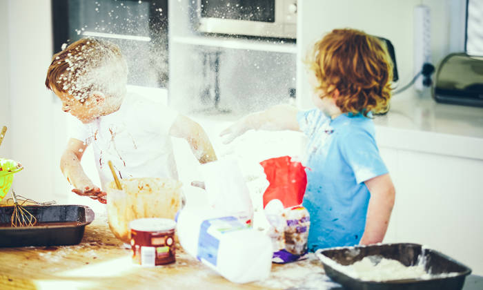 Children fighting in the kitchen