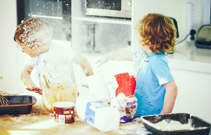 Children fighting in the kitchen