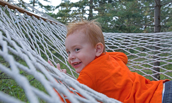 Young boy climbing