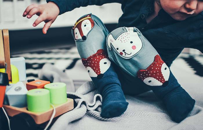 Little girl playing with blocks