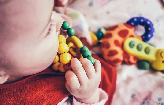Baby and toy - First 1000 days of life