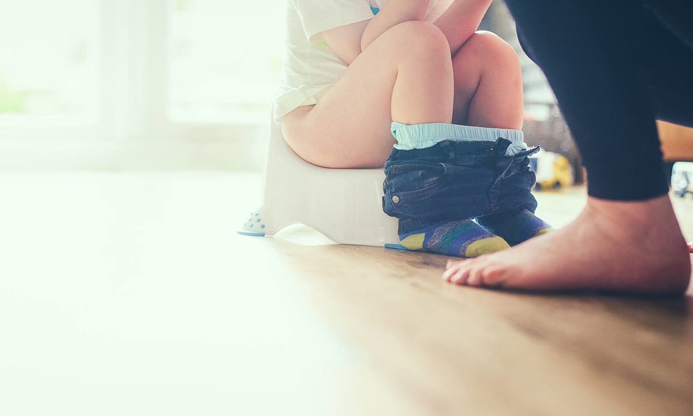 Teaching child how to use his potty