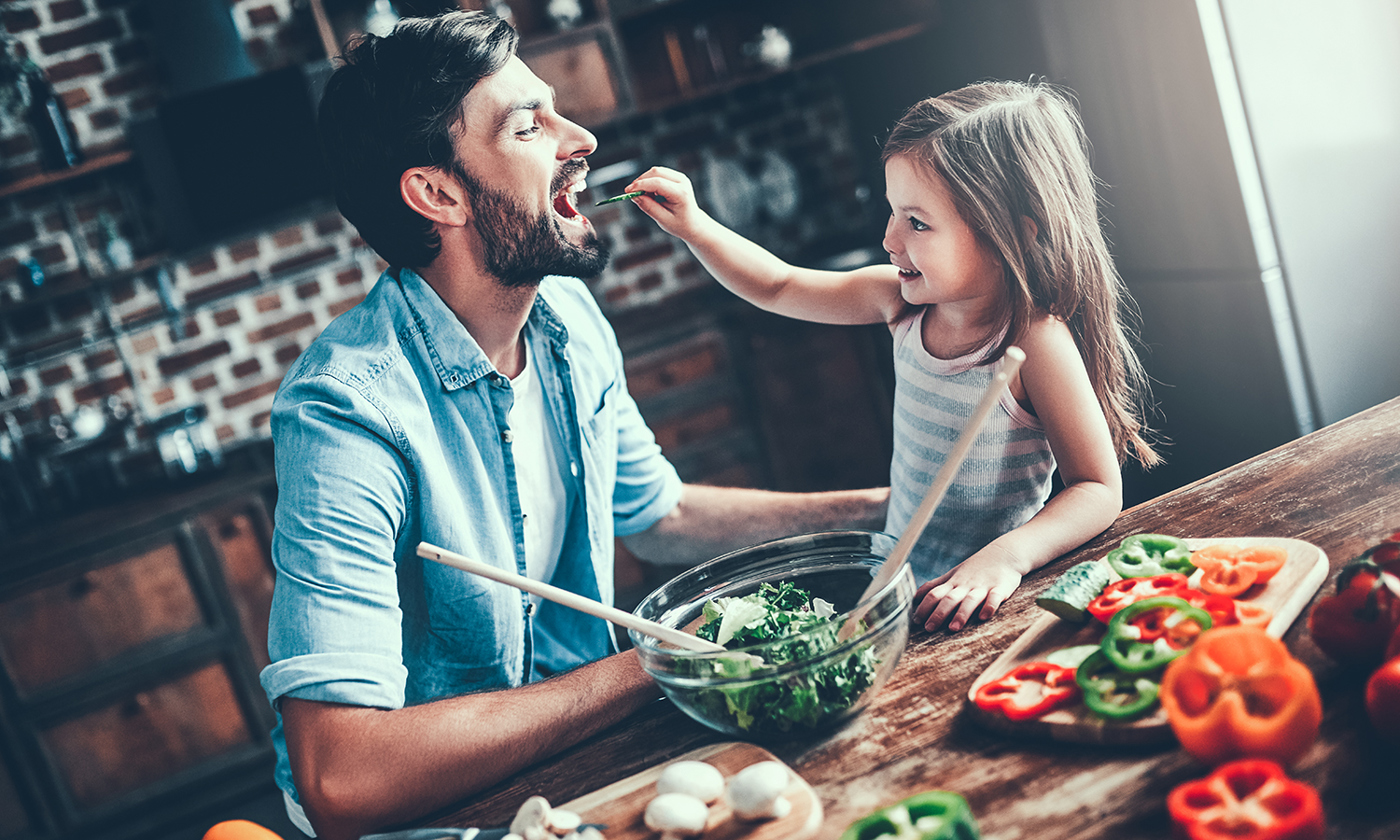Dad with daughter in the kitchen