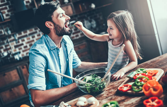 Dad with daughter in the kitchen