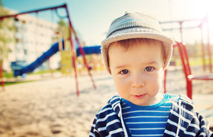 Little boy playing on playground