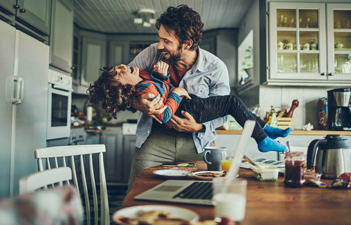 Father and son playing