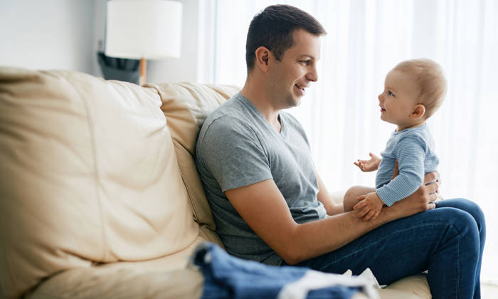 Father and child on the lounge