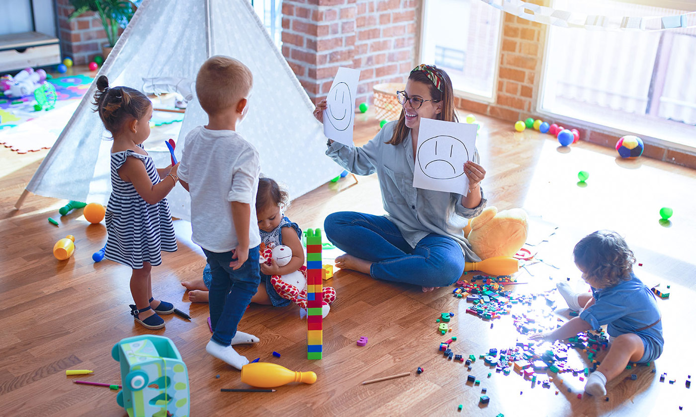 Group of toddlers using emotions emojis