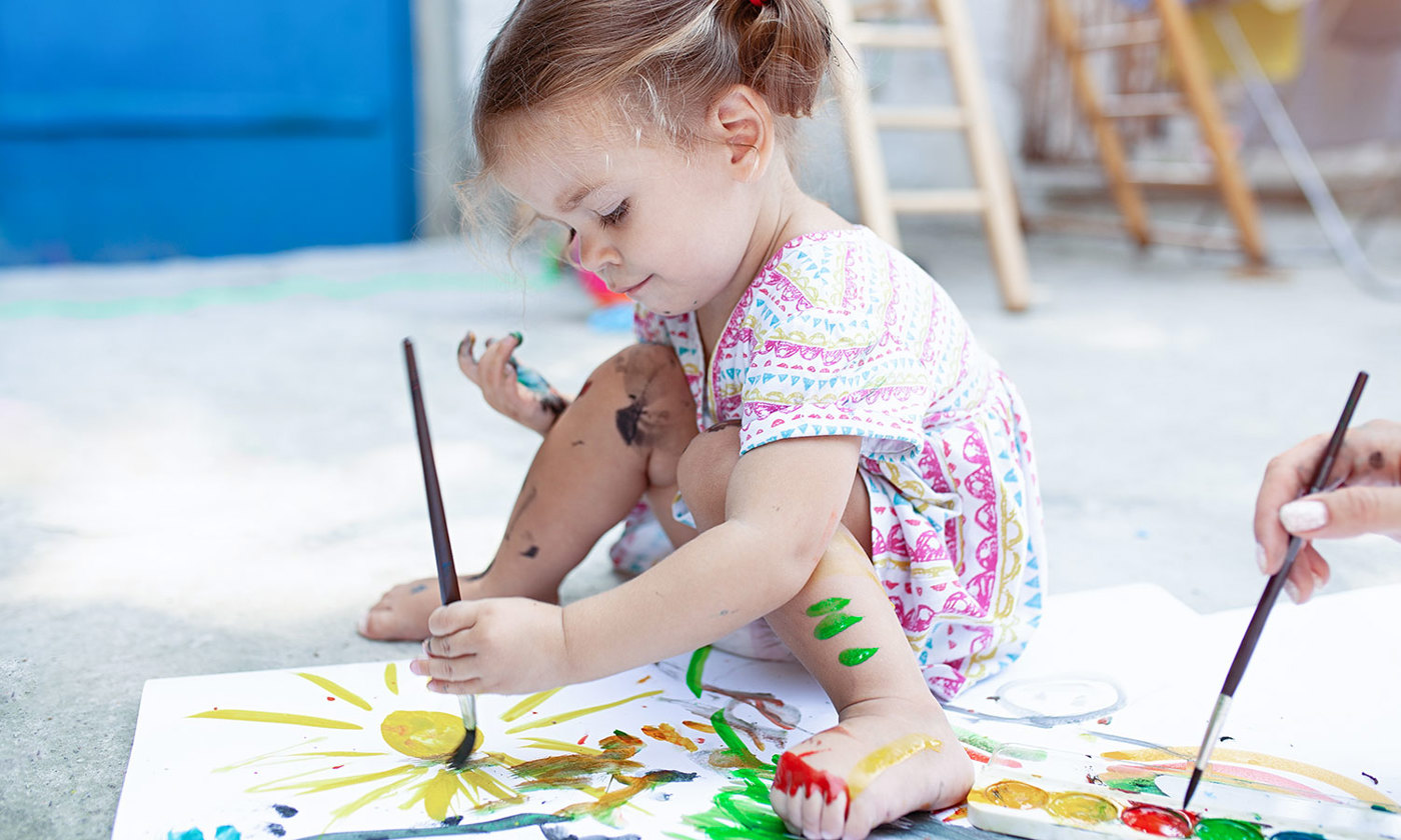 Girl enjoying painting
