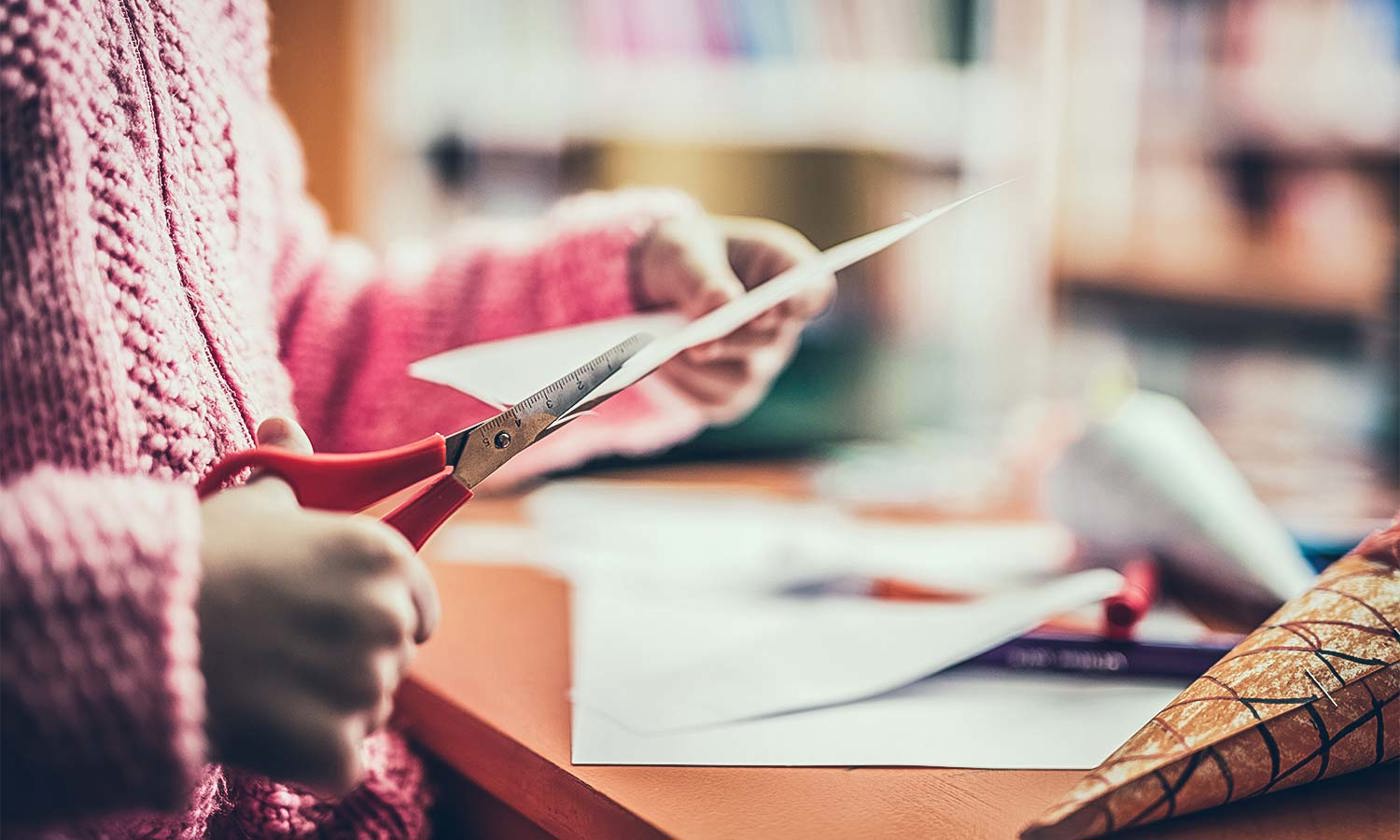 Child's hands doing craft