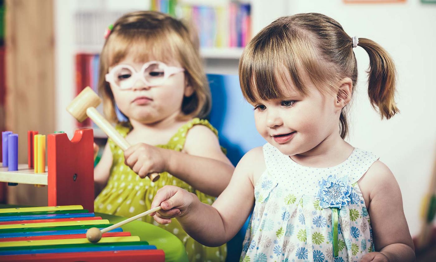 Toddlers enjoying music